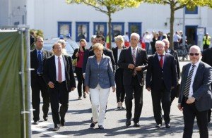 German Chancellor Angela Merkel visits refugee center in Heidenau, Germany on Aug. 26, 2015 (Reuters)