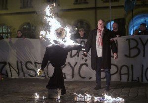 Protesting against the immigration of Muslims and Syrian refugees, demonstrators in Wroclaw on Nov 18, 2015 burn an Orthodox Jew in effigy (Reuters)