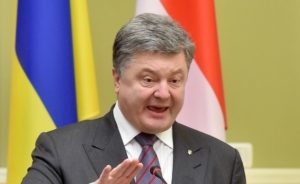 Ukrainian President Petro Poroshenko signs law in 2014 banning Russian films in Ukraine (AFP)
