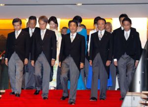 Japan's new government cabinet, pictured on Aug 3, 2016, PM Shinzo Abe is at center of photo (Shizuo Kambayashi, Associated Press)