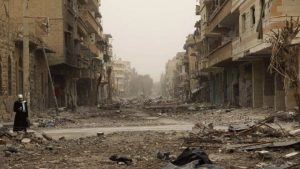 Shattered eastern Syria city of Deir al-Zour pictured in Feb 2013 (Reuters)