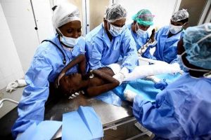 Cuban doctors treating a patient in Haiti