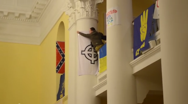 Canada’s Foreign Ministry provided shelter to the neo-Nazis (above) who occupied and vandalized Kiev’s city hall in 2014.